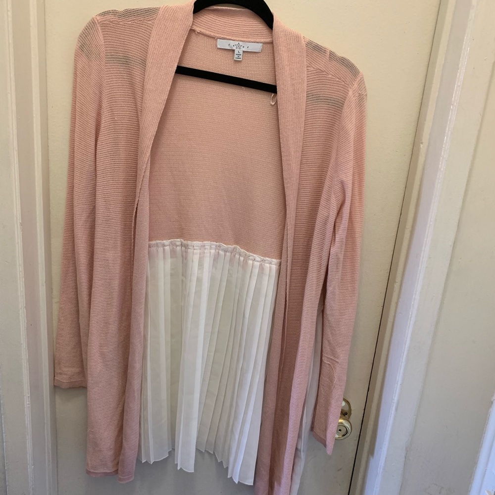 Woman’s pink cardigan